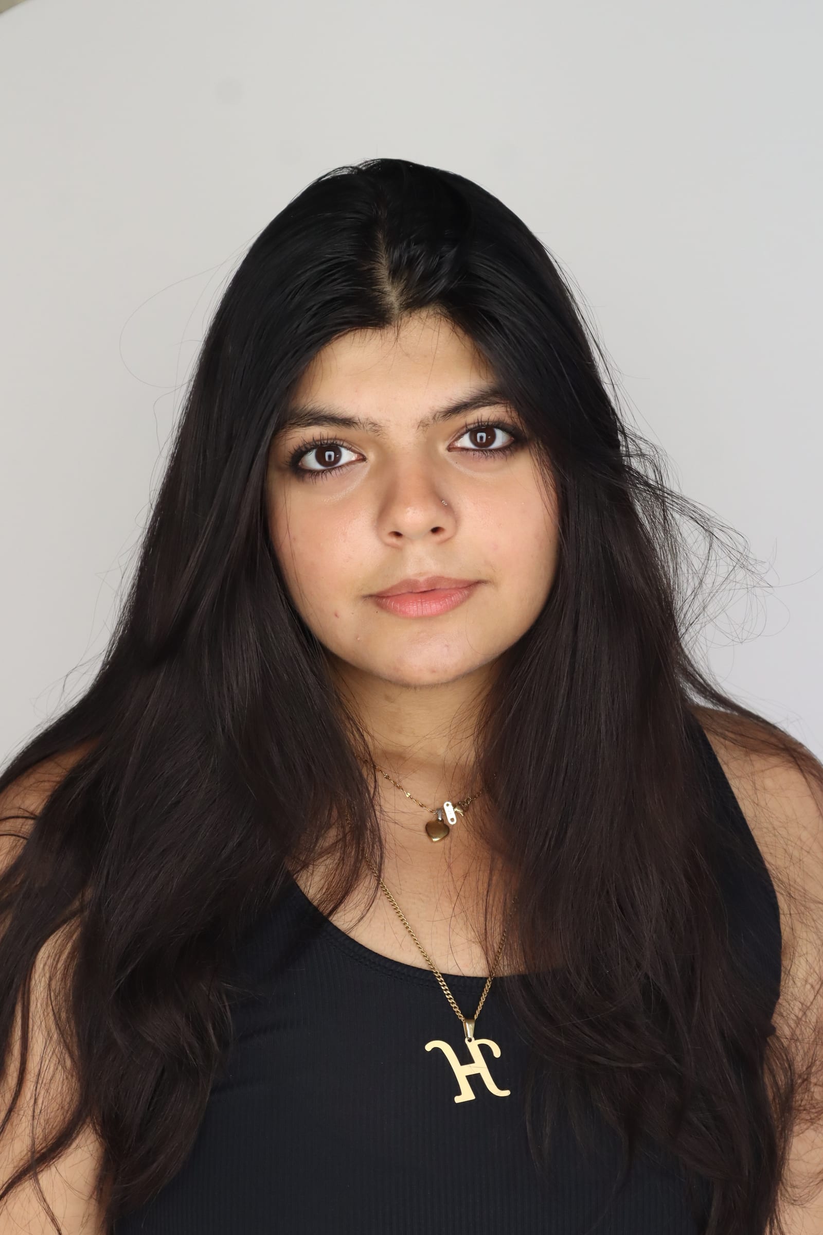 Himani Jamwal headshot, neutral expression, direct gaze